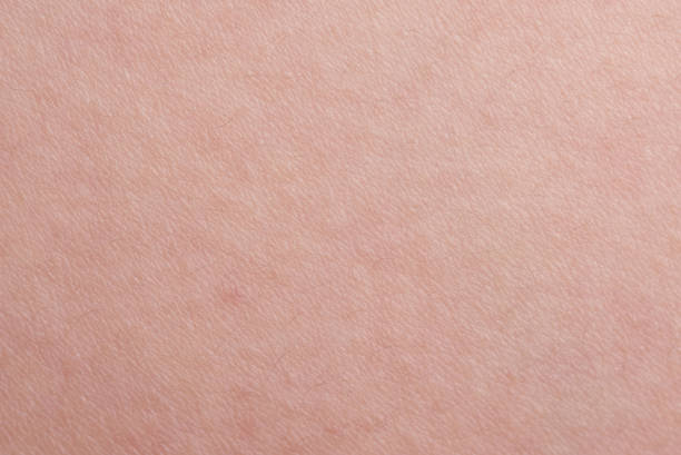 istock Texture of pink human skin 949809002