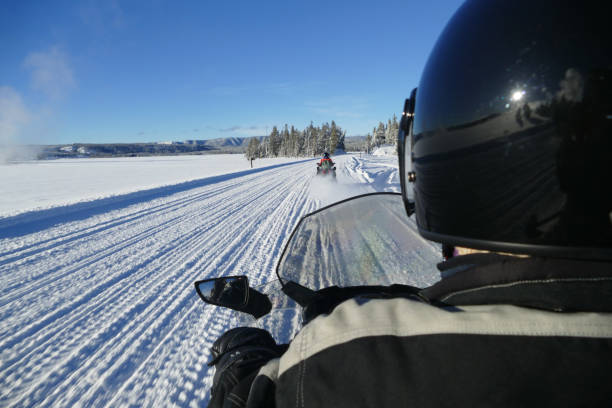 istock Snowmobile guided tour, Yellowstone National Park 949831280