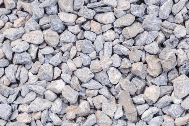 istock Stone pebbles texture or stone pebbles background for interior exterior decoration and industrial construction design. Stone pebbles motifs that occurs natural. 949845328