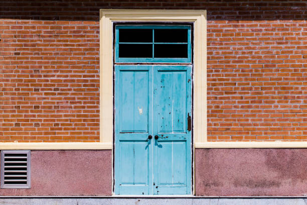 istock Blue door and the brick wall. 949848614
