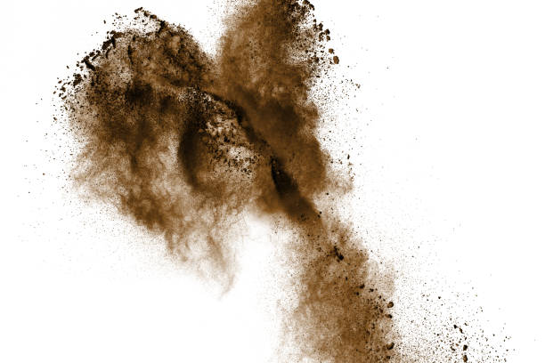 istock abstract brown dust explosion on white background. abstract brown  powder splattered on white background, Freeze motion of brown  powder splashing. 949848774