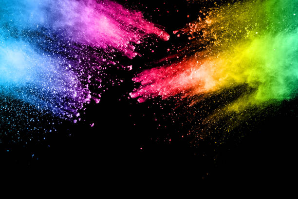 istock Multi color powder explosion isolated on black background. Colored dust splash cloud on black background. Launched colorful particles on background. Painted Holi. 949848942