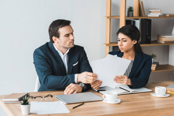istock Business colleagues having a discussion about project in modern office 949851400