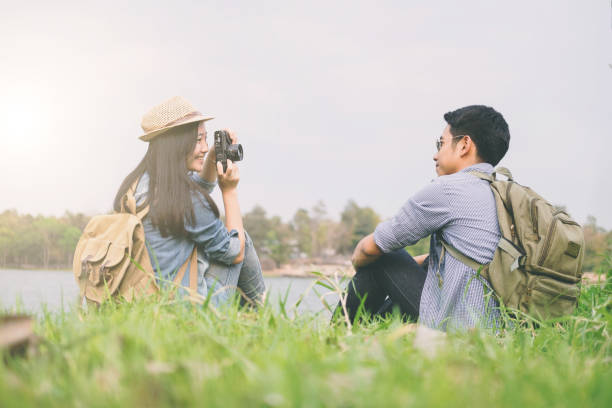istock Couple travel outdoors and take a photo. 949857464