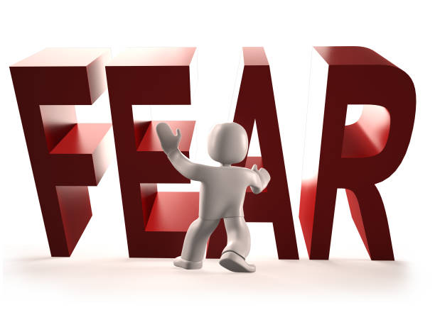 istock 3d man stopping red FEAR word falling, 3D illustration 949859954