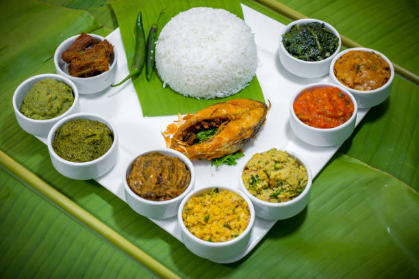 istock Bangla Cuisine Vorta, vaji, fish curry and vegetables curry platter. 949864510