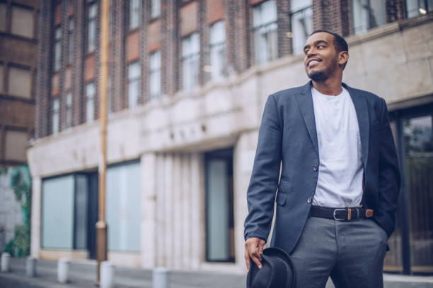 istock Young man standing outdoors 949869188