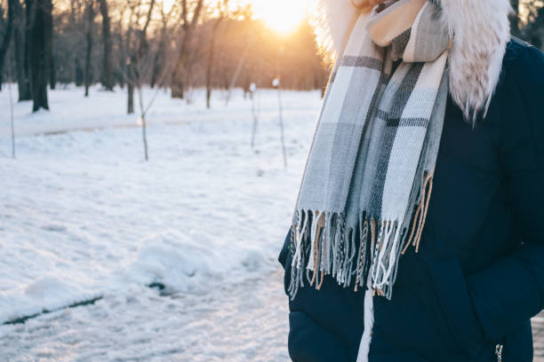 istock Unrecognizable young woman wearing down jacket 949870350