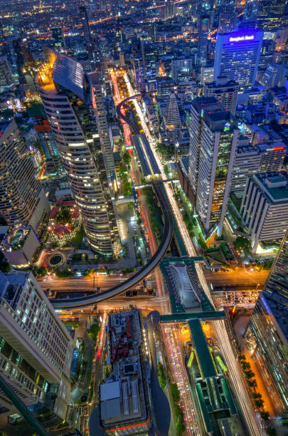 istock Traffic and Modern building night view 949875124