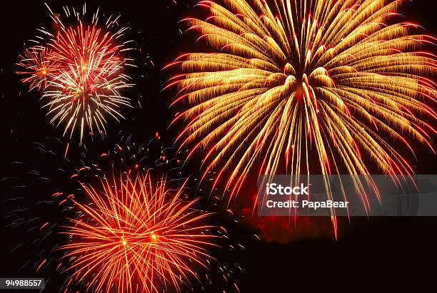 Shimmering Fireworks Stock Photo - Download Image Now - Anniversary, Backgrounds, Black Color