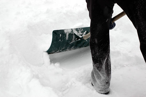 istock A person shoveling the snow after snowfall 94989054