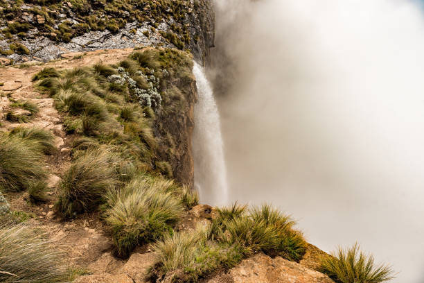 Top of Tugela Falls, the second tallest waterfall on earth Tugela Falls, the second tallest waterfall on earth. The Tugela River plunges 948 m in five steps from the top of the Amphitheatre in the Drakensberg drakensberg mountain range stock pictures, royalty-free photos & images