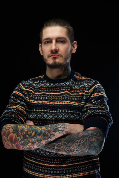 istock Portrait of a man with tattooes. 949895864