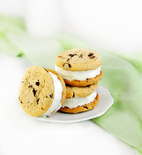istock Stack of chocolate chip cookie ice cream sandwiches on plate 94990102
