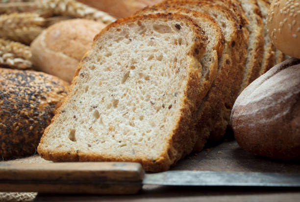 istock heap of sliced and solid loafes of bread 949902554