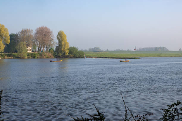 These small boats help the ferry to cross the river the Lek near Culemborg.
