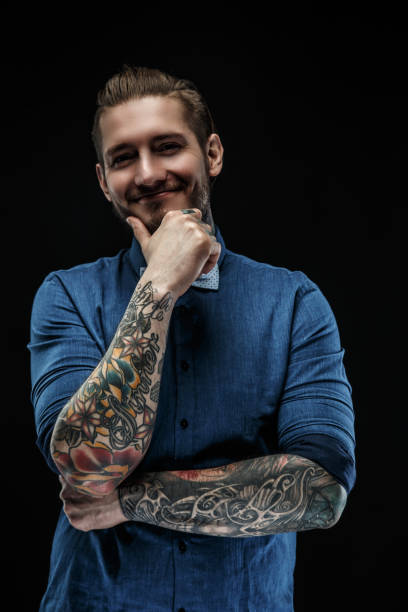 istock Male in blue t shirt. 949905684
