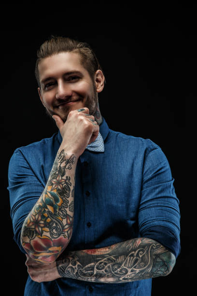 istock Male in blue t shirt. 949910392
