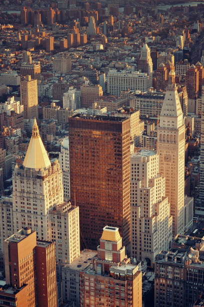 New York City historical skyscrapers New York City historical skyscrapers and urban cityscape at sunset. new york life building stock pictures, royalty-free photos & images