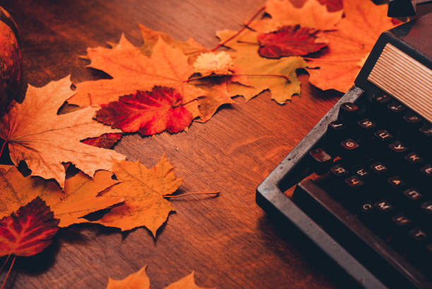 istock old typewriter with leaves. concept autumn 949917054