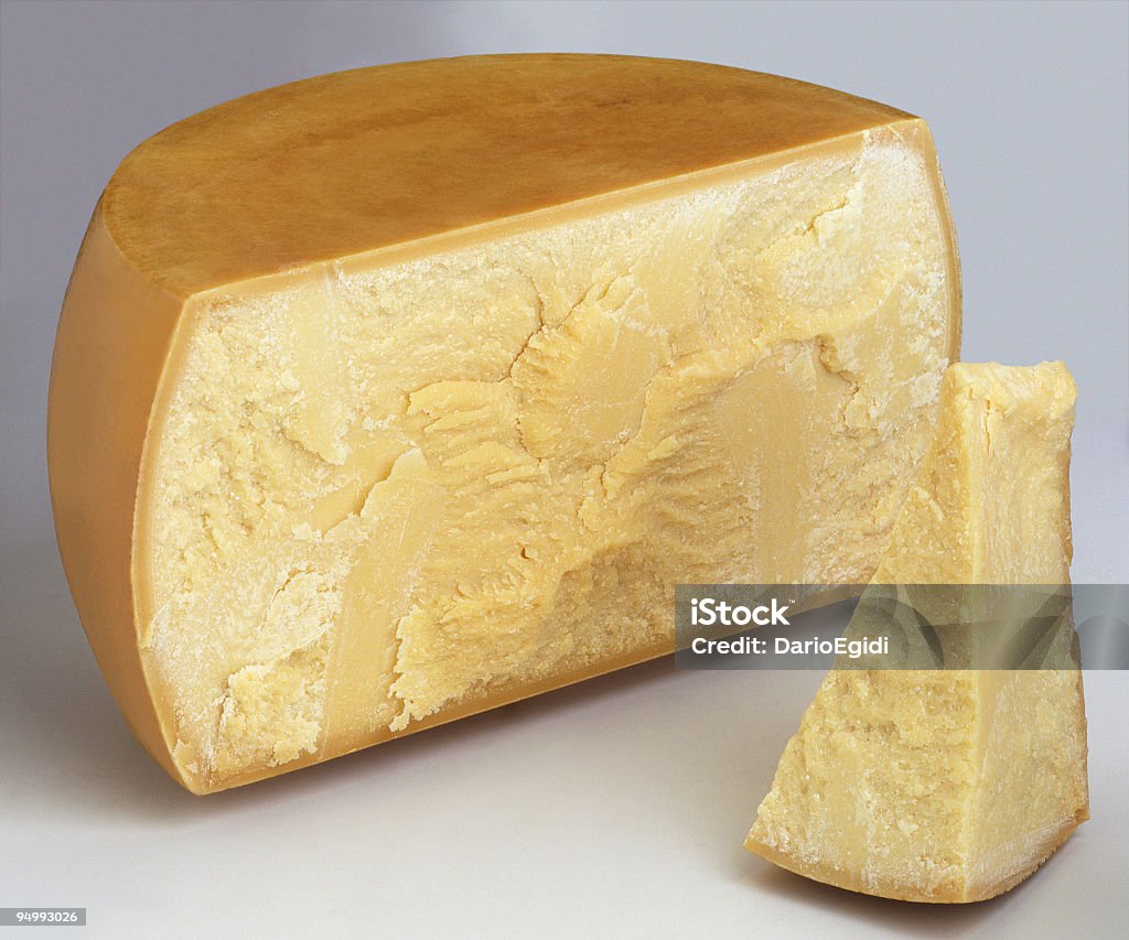 Meia italiano e um pedaço de queijo parmesão - Foto de stock de Figura para recortar royalty-free