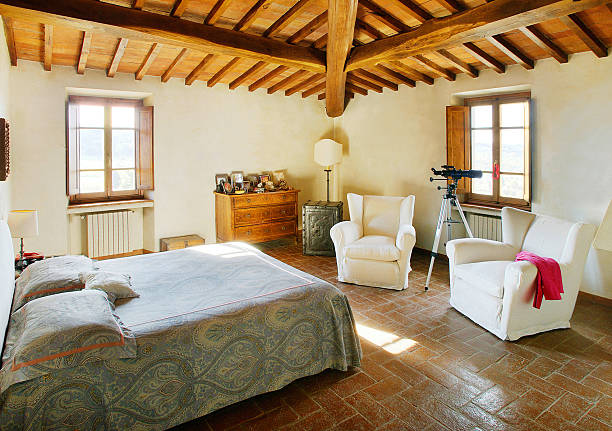 istock Sunny bed-room with raftered ceiling in a beautiful rustical house 94993223