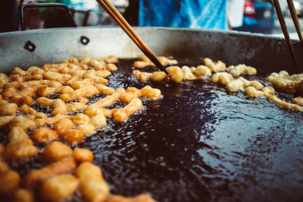 istock Making of Deep fried doughsticks or Pa Thong Ko. 949944678