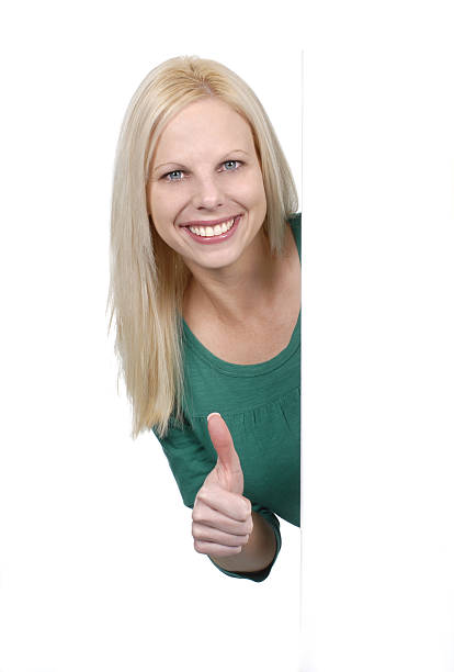 Friendly girl with her thumb up