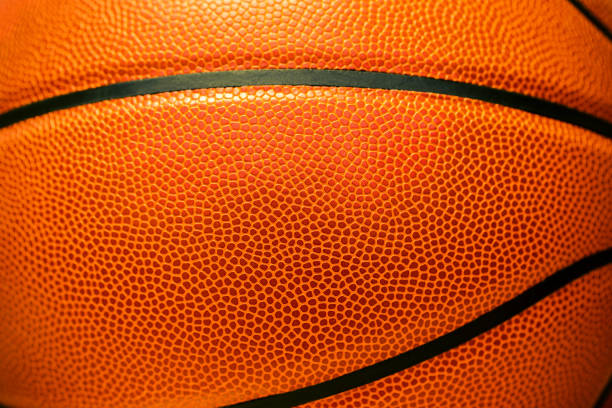 primo piano di sfondo basket in pelle strutturato - sport tradizionale foto e immagini stock