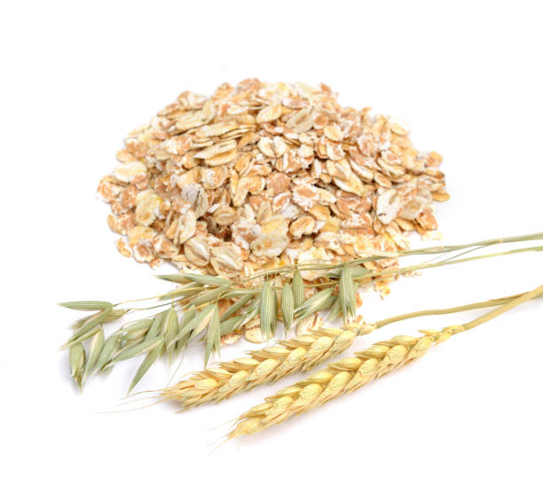 istock Oat and wheat flakes with herb. 949951454