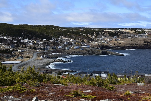 view along the end of the bay with the village of Flatrock in the background, Early Spring scene, Newfoundland Canada