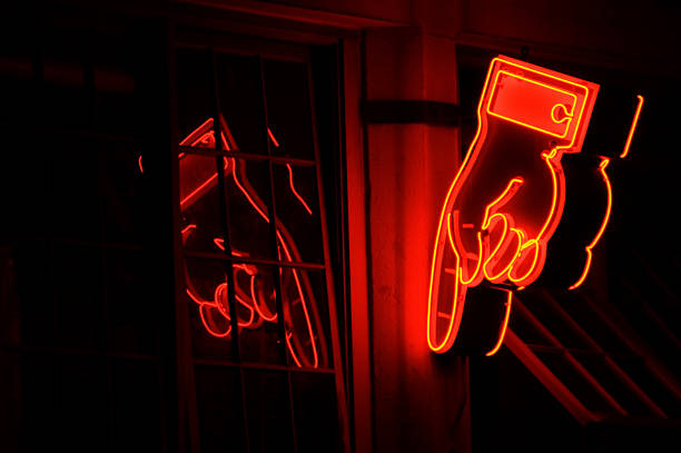 Neon hand  entrance sign photos stock pictures, royalty-free photos & images