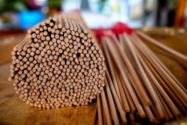 istock Close-up Incense Sticks. It is be used for paying respect to monk or Buddha image. 949966500