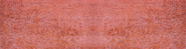istock panorama of red brick wall background 949968112