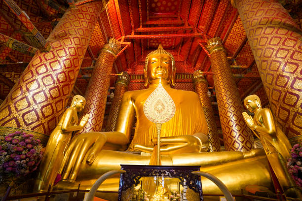 istock Buddha statue in Wat Phananchoeng, Ayutthaya, Thailand. 949968616