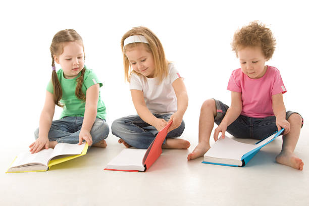 istock Little girls reading books 94998278