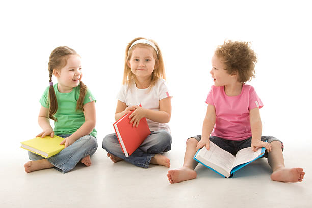 istock Little girls reading books 94998279