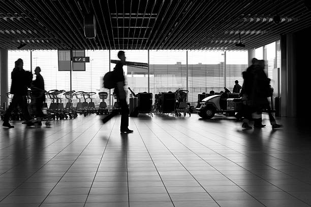 istock People walking in the airport 94998341