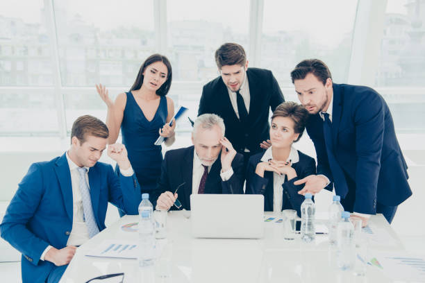istock Concentrated managers working together and discussing financial plan 949984076