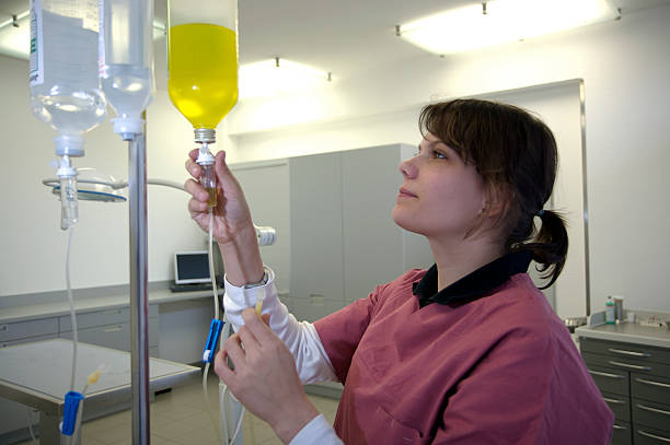 istock young nurse is preparing an infusion 94999199