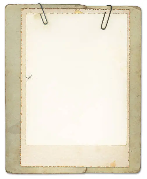 Photo of Blank Vintage Papers Clipped Together