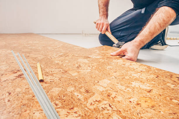 istock Master class for laying cork flooring, installation of a cork floor by a floating method, connection of a series of cork flooring 950010876