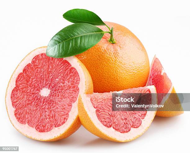 Grapefruits And Segments With A Leaves Stock Photo - Download Image Now - Branch - Plant Part, Circle, Citrus Fruit