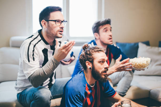 istock Irritated male football supporters 950020154