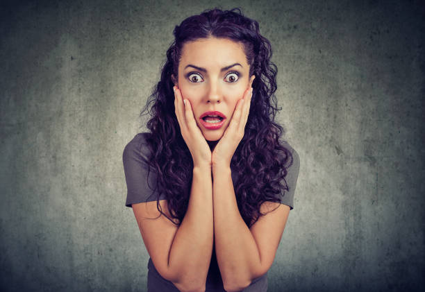 istock Amazed shocked woman looking at camera 950027952