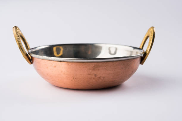 istock empty Indian Kadhai or Karhai or frying pan or iron wok isolated on white background 950032142
