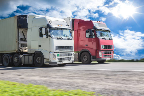 istock Trucks moving along the highway 950032460