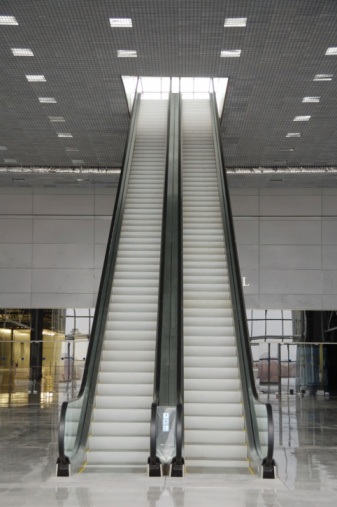 This is a photograph of a descending escalator in Amsterday.