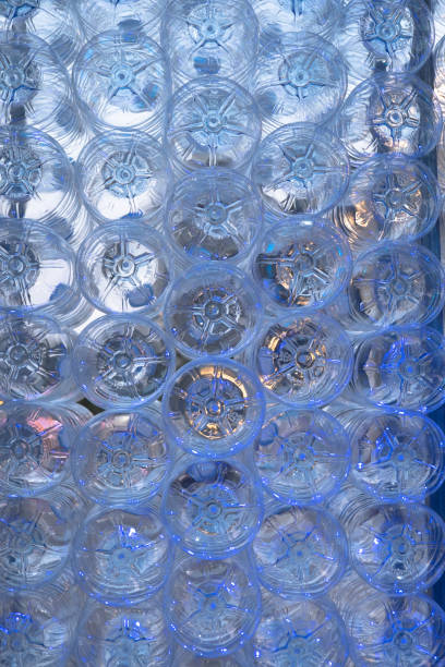 istock Close-up shot of stack of recyclable plastic bottles on white background. 950035508