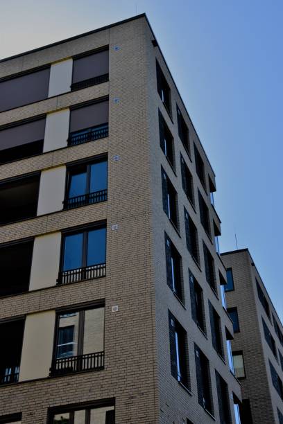istock corner of a modern glass apartment building 950040394